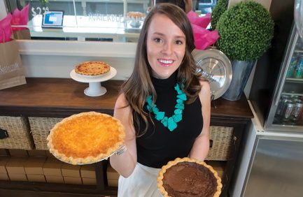 Amanda Wilbanks, owner of Southern Baked Pie Company, displays some of her pies at her storefront in Gainesville.