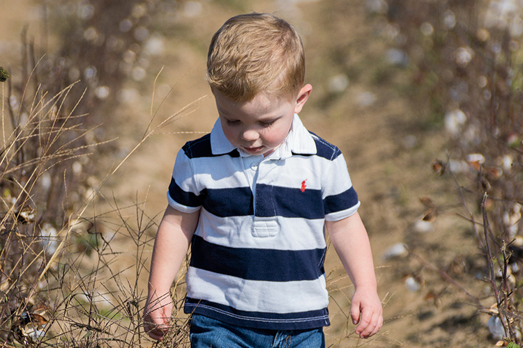 arkansas grown image boy in cotton by Victoria Sides 