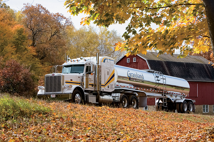 A milk tanker picks up milk from a Wisconsin dairy farm. Grassland Dairy produces about 25 percent of the butter made in the United States.