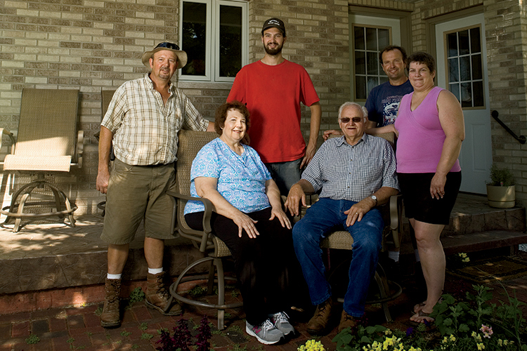 The Diedrich family owns and operates a dairy farm in Twin Lakes that has been passed down for three generations. Front Row: Sandra and Richard Diedrich; Back Row: Son John, grandson Justin, son Philip and his wife, Kim.