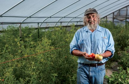 Don Bustos in his greenhouse