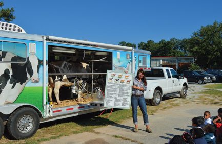 Nicole Karstedt teaches students about where their milk comes from through the Georgia Mobile Dairy Classroom.