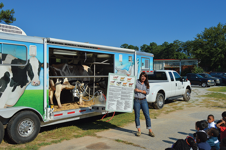 Nicole Karstedt teaches students about where their milk comes from through the Georgia Mobile Dairy Classroom.