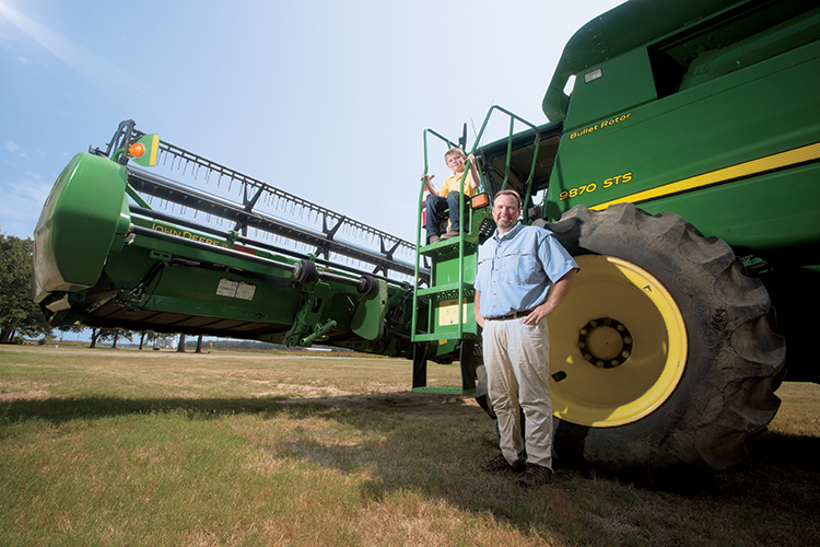 Andy Noble and his son, Jack, represent the fourth and fifth generations on Noble Farms in Arkansas County.