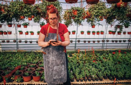 Woman in greenhouse