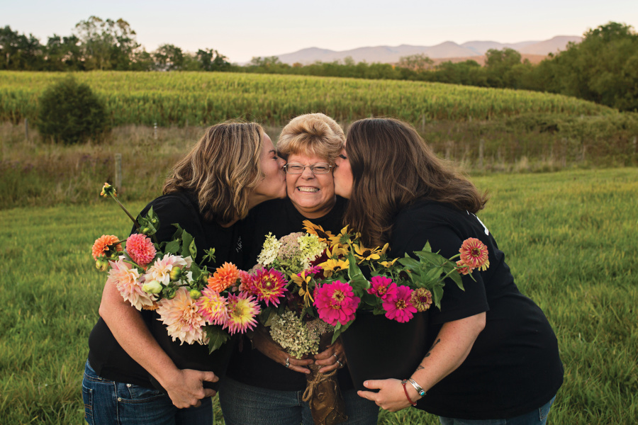 Jessica Hall, right, and her mother Chris Auville, center, and sister Stephanie Auville at Harmony Harvest