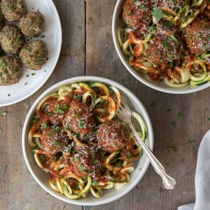 Spinach Herb Meatballs over Zucchini Noodles