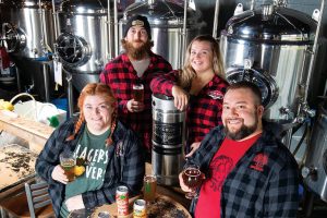 Kings Bluff Brewery in Clarksville crafts hyper-local products with the help of a knowledgeable team including (from left to right) head brewer Jessica Atkinson, Zach Daneker, Ashley Hunt and co-founder Dustyn Brewer.
