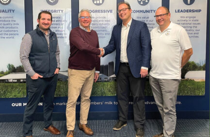 From left: Tom Downey, Michigan Milk Producers Association chief financial officer; Joe Diglio, Michigan Milk Producers Association president and CEO; Omid McDonald, Dairy Distillery CEO; and Dave Geros, Dairy Distillery chief science officer